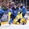 COLOGNE, GERMANY - MAY 20: Sweden's Oscar Lindberg #15 gets tangled up with Finland's Lasse Kukkonen #5 while Ville Lajunen #47 looks on during semifinal round action at the 2017 IIHF Ice Hockey World Championship. (Photo by Andre Ringuette/HHOF-IIHF Images)

